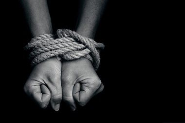 Modern Slavery Promotional Image Showing Tied Hands